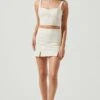 Monet Double Slit Mini Skirt 1 Monet Double Slit Mini Skirt -Outlet Cozi Luxe Store ACS9093B CREAM 1 f1c5ebfb 2514 404a bdf6 2abc6361198b